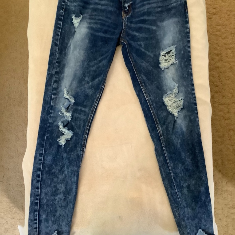 K’s More distress acid washed jean. Cut out bottom and frayed hem.